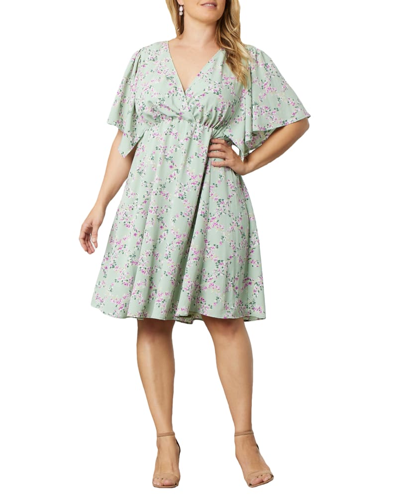 Front of a model wearing a size 4X Isabel Flutter Sleeve Dress in SAGE TRELLIS PRINT by Kiyonna. | dia_product_style_image_id:274977